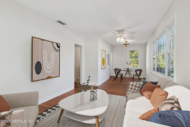 living room with dark hardwood / wood-style floors