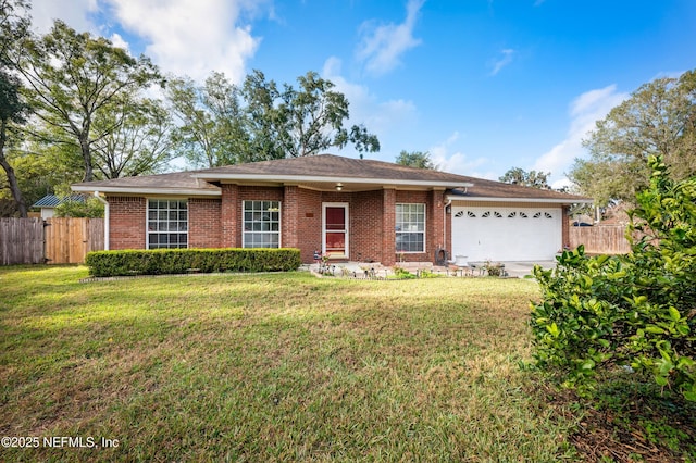 ranch-style house with a garage and a front lawn