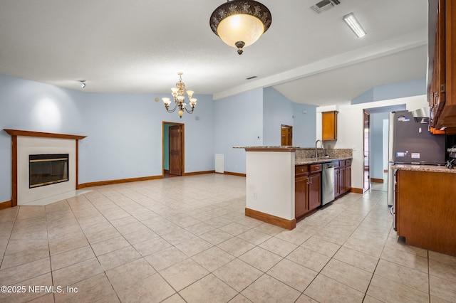 kitchen with sink, a notable chandelier, vaulted ceiling with beams, and dishwasher