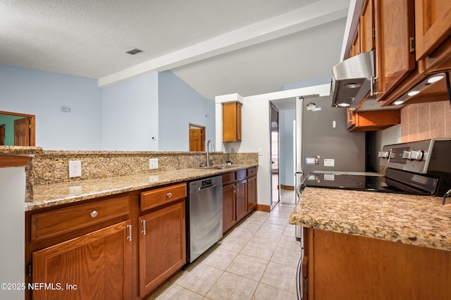 kitchen with light tile patterned floors, dishwasher, stove, light stone counters, and a textured ceiling