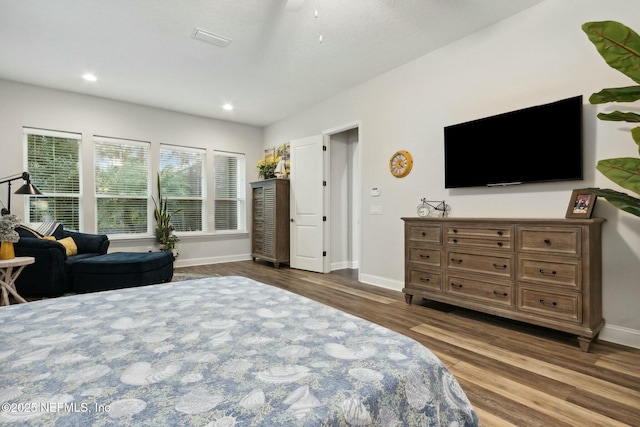 bedroom featuring dark hardwood / wood-style floors