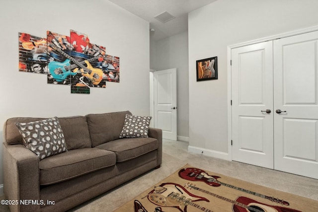 living room featuring light colored carpet