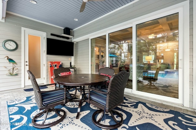 view of patio / terrace featuring ceiling fan