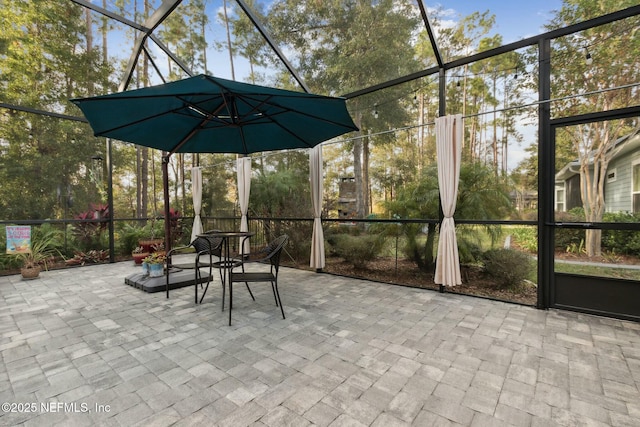 view of patio / terrace with glass enclosure