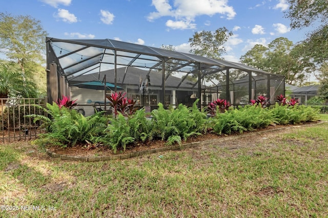 view of yard with a lanai