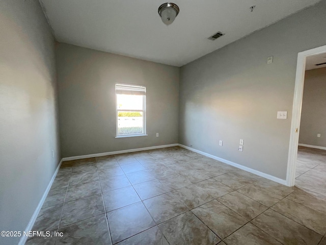 view of tiled spare room