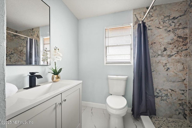 bathroom featuring toilet, vanity, a wealth of natural light, and curtained shower