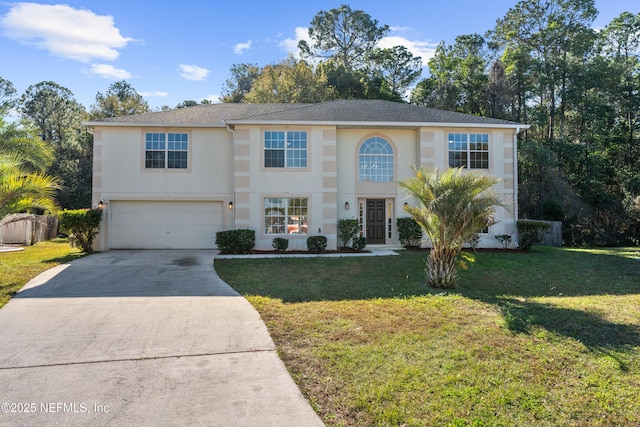 view of front of property with a garage, driveway, a front lawn, and stucco siding