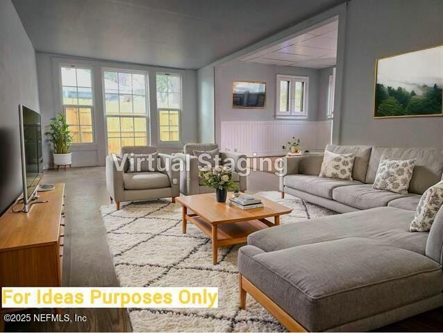 living room with concrete flooring