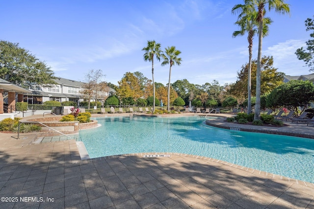 view of swimming pool featuring a patio