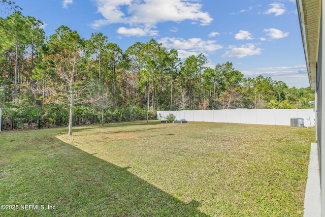 view of yard featuring central AC