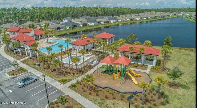 bird's eye view with a water view