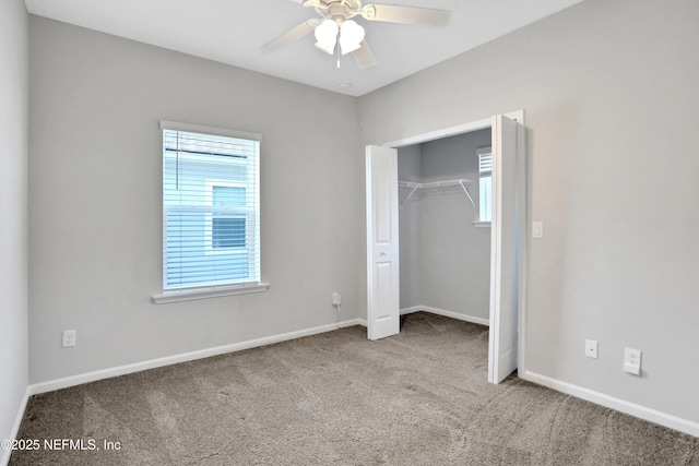 unfurnished bedroom with carpet, ceiling fan, and a closet