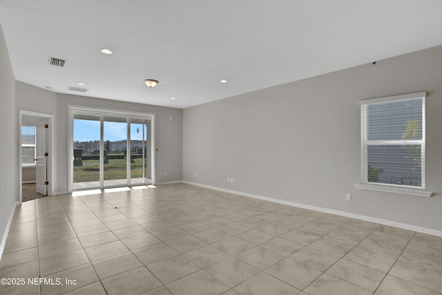 view of tiled spare room