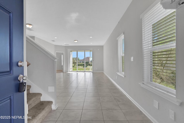 foyer with light tile patterned floors