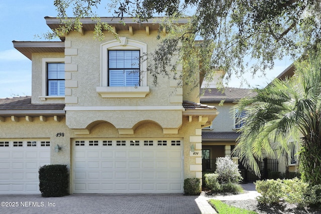 view of front of home with a garage