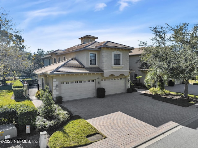 view of front of property with a garage