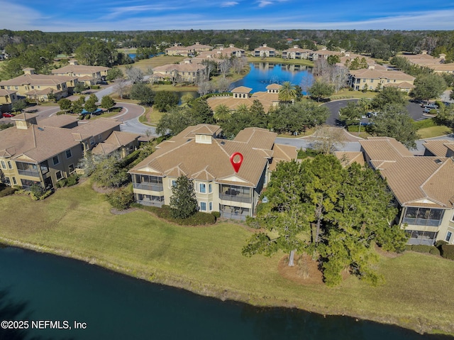 drone / aerial view featuring a water view