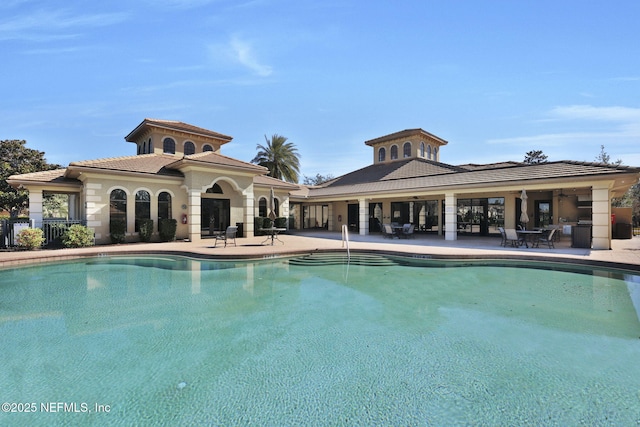 view of swimming pool featuring a patio