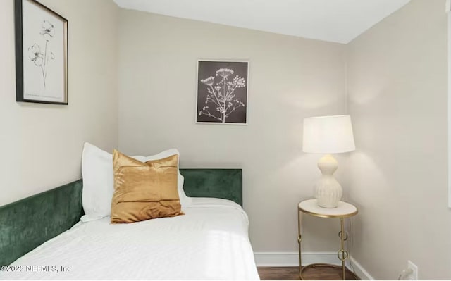 bedroom featuring lofted ceiling