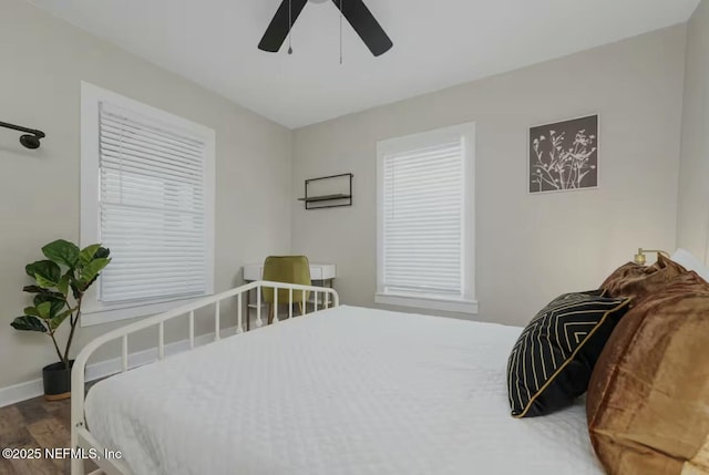 bedroom featuring hardwood / wood-style floors and ceiling fan