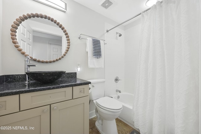 full bathroom with shower / bath combination with curtain, vanity, and toilet