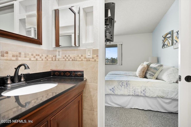 bathroom featuring vanity and a textured ceiling