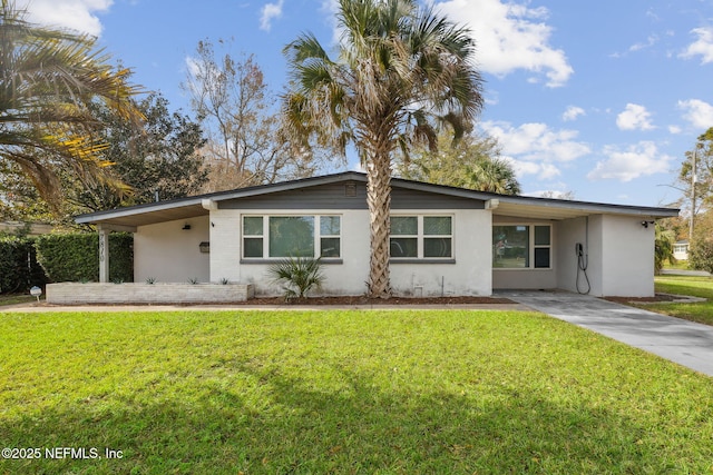 single story home with a front lawn