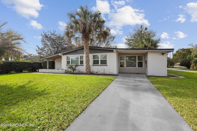 ranch-style house featuring a front lawn