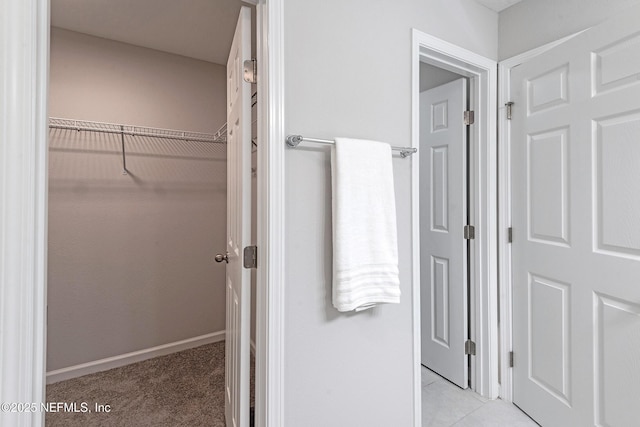 bathroom with tile patterned flooring