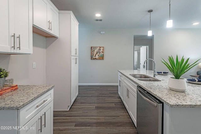 kitchen with dishwasher, sink, decorative light fixtures, a center island with sink, and white cabinets