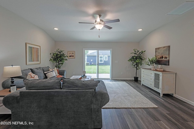 living room with ceiling fan, dark hardwood / wood-style flooring, and vaulted ceiling