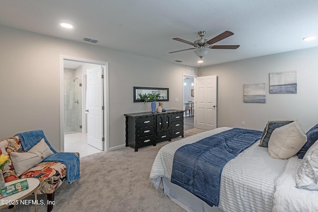 carpeted bedroom featuring connected bathroom and ceiling fan