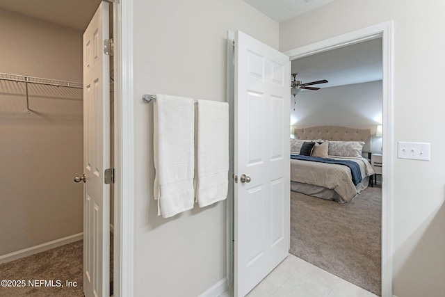 bathroom featuring ceiling fan