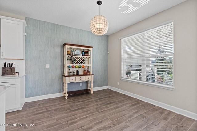 dining room with hardwood / wood-style floors