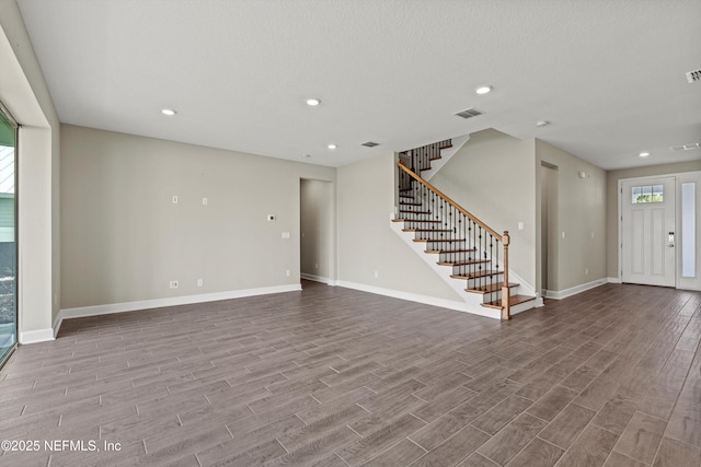 321 Marquesa Cir, Saint Johns, FL 32259 - unfurnished living room with wood finished floors, baseboards, stairs, and recessed lighting