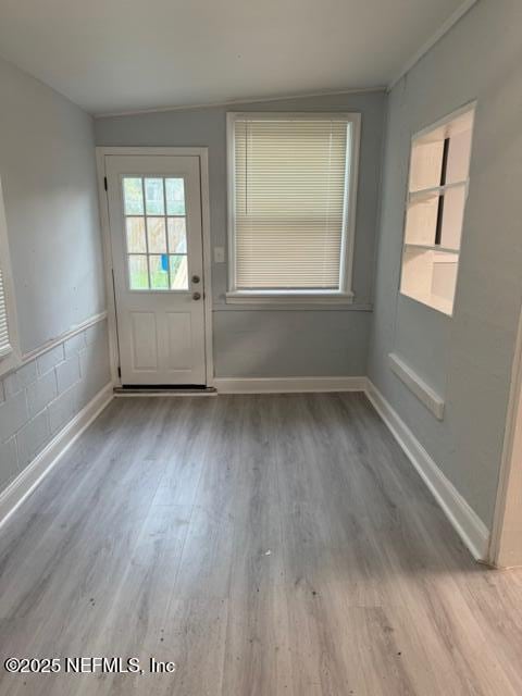 doorway to outside featuring light hardwood / wood-style floors