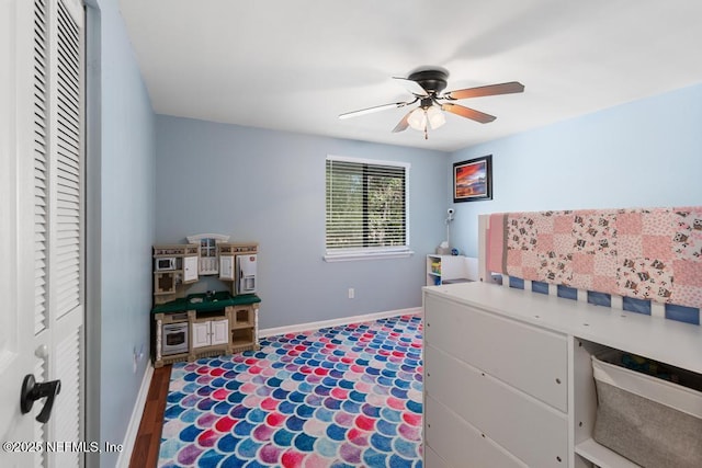 bedroom featuring ceiling fan