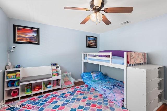 bedroom featuring ceiling fan and wood-type flooring