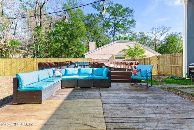 deck with outdoor lounge area