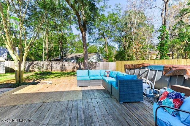 wooden deck with outdoor lounge area