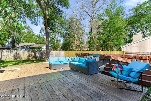 wooden terrace featuring an outdoor hangout area