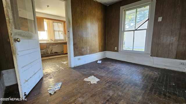 unfurnished dining area with wooden walls