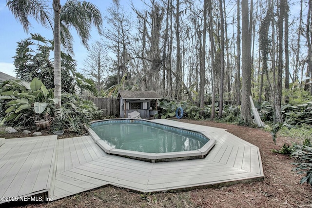 view of pool featuring a deck