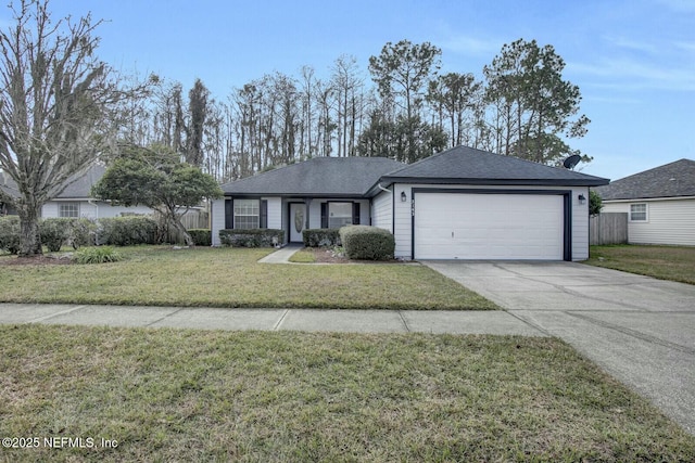 ranch-style house featuring a front yard and a garage