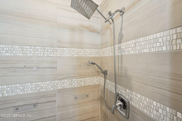 bathroom featuring tiled shower