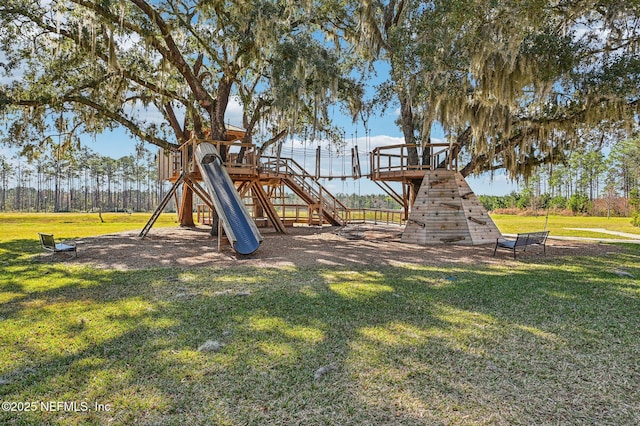 view of play area featuring a lawn