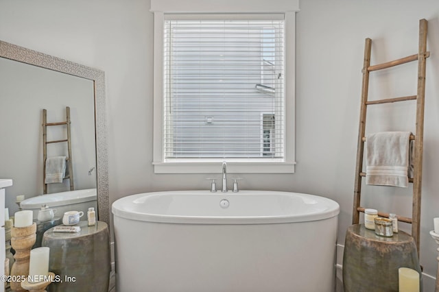 bathroom featuring a tub