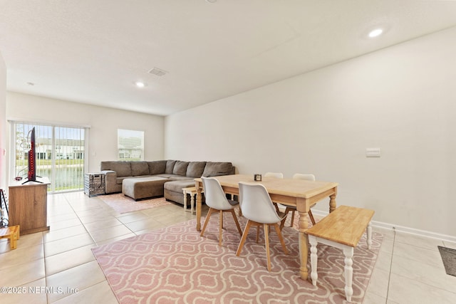 dining room featuring light tile patterned flooring