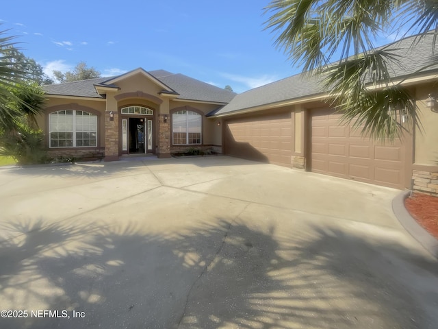 view of front of home featuring a garage